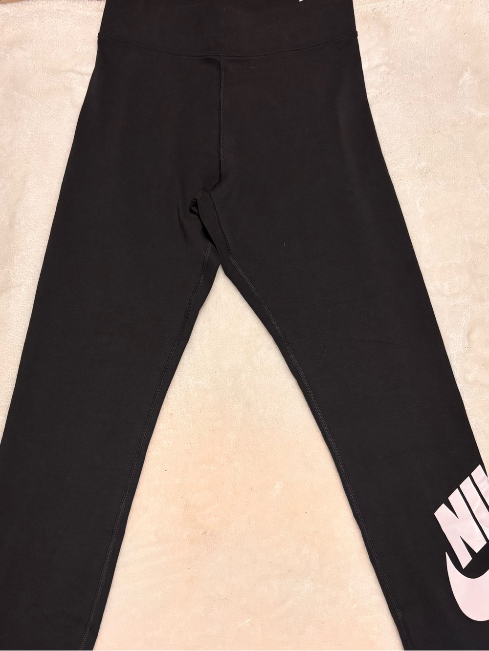 Nike women size small  Black Leggings with white Nike Swoosh